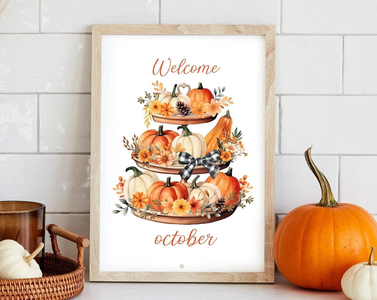 Framed canvas wall art featuring a seasonal arrangement of pumpkins and autumn foliage with the word welcome and october