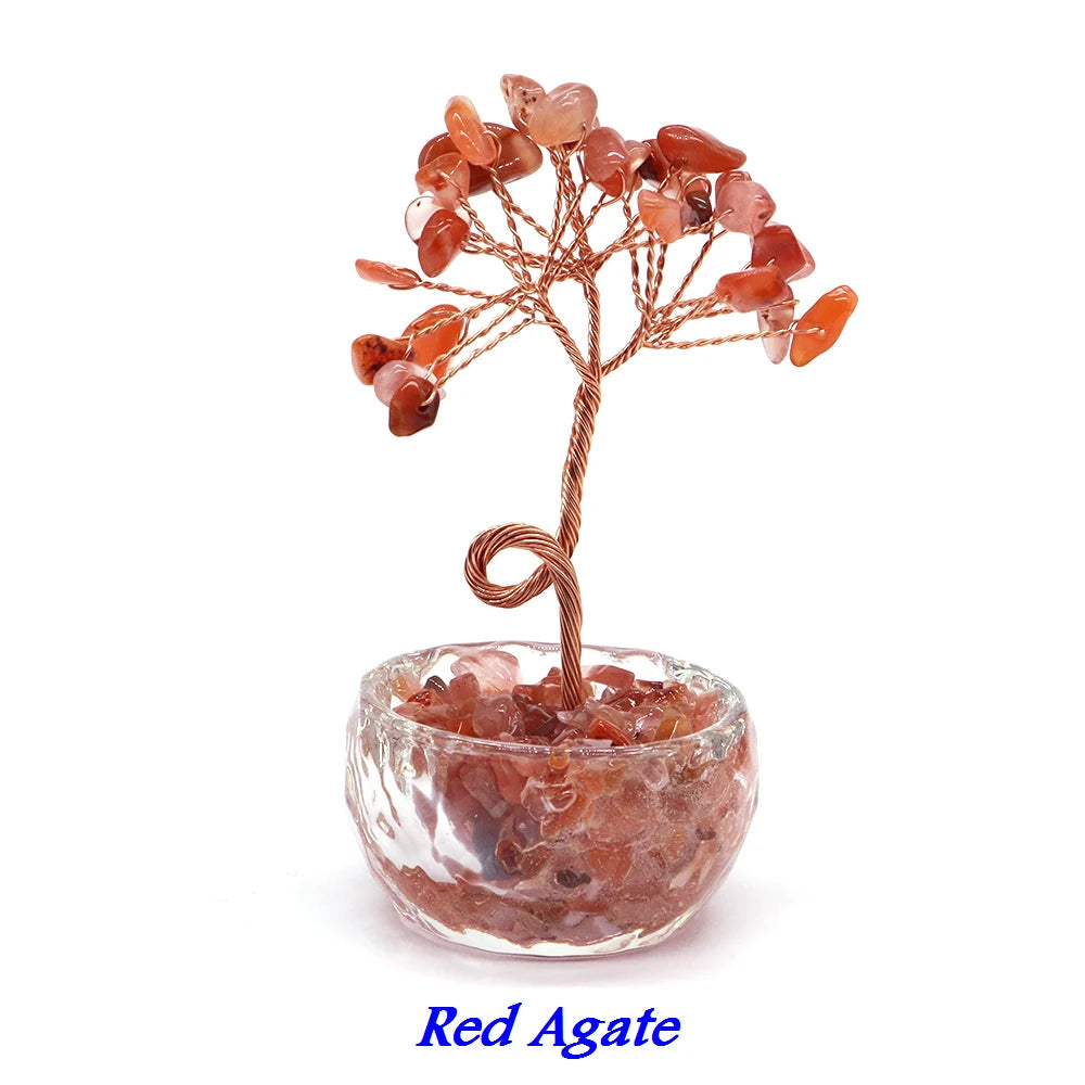 A Red Agate crystal healing gemstone bonsai featuring reddish-orange crystals on a wooden branch set in a glass bowl.