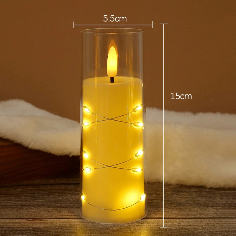 A tall glass candle holder filled with yellow wax, featuring a lit flame and surrounding LED star string lights.