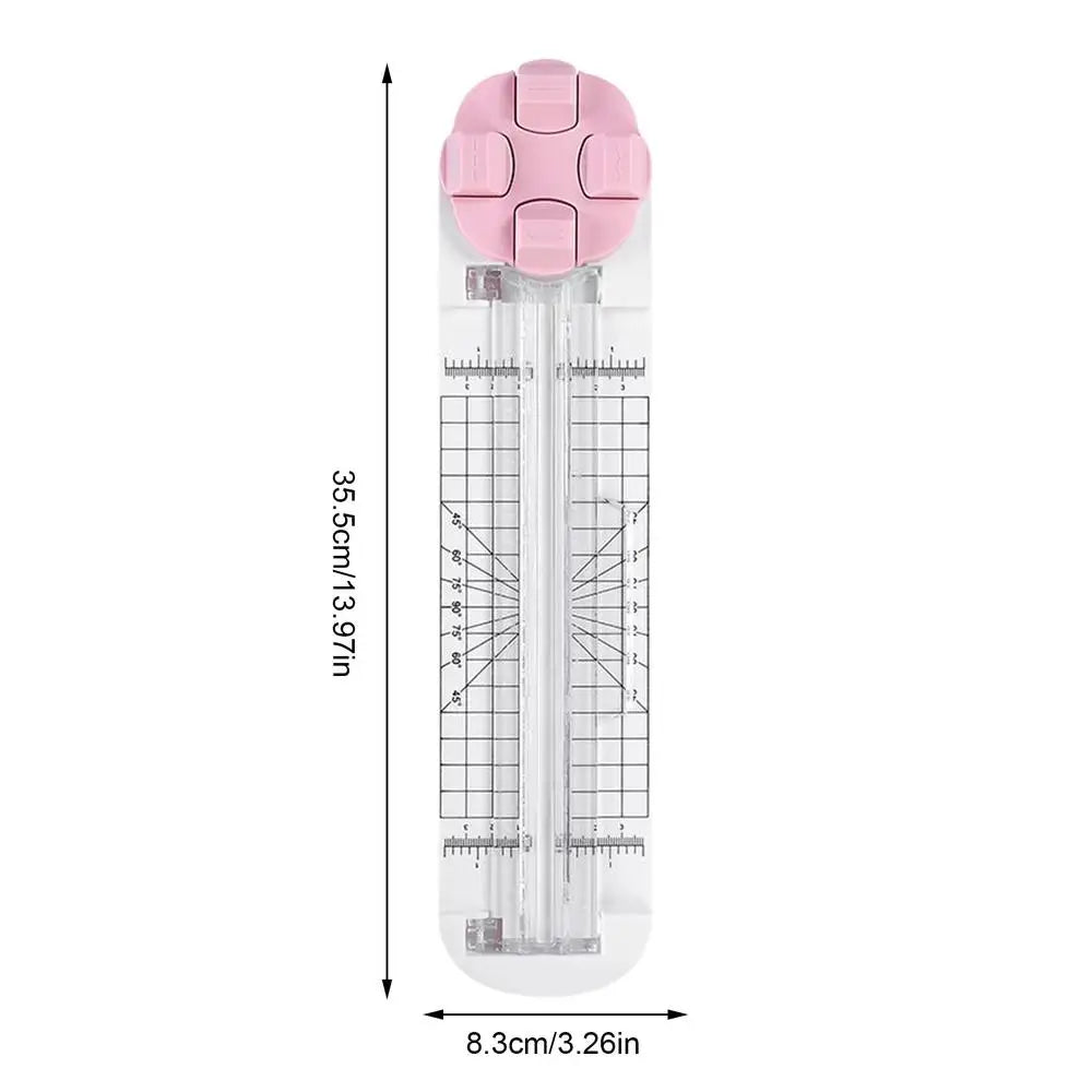 Cutter multifonction rose avec lame et guide en plastique transparent, longue de 35,5 cm.