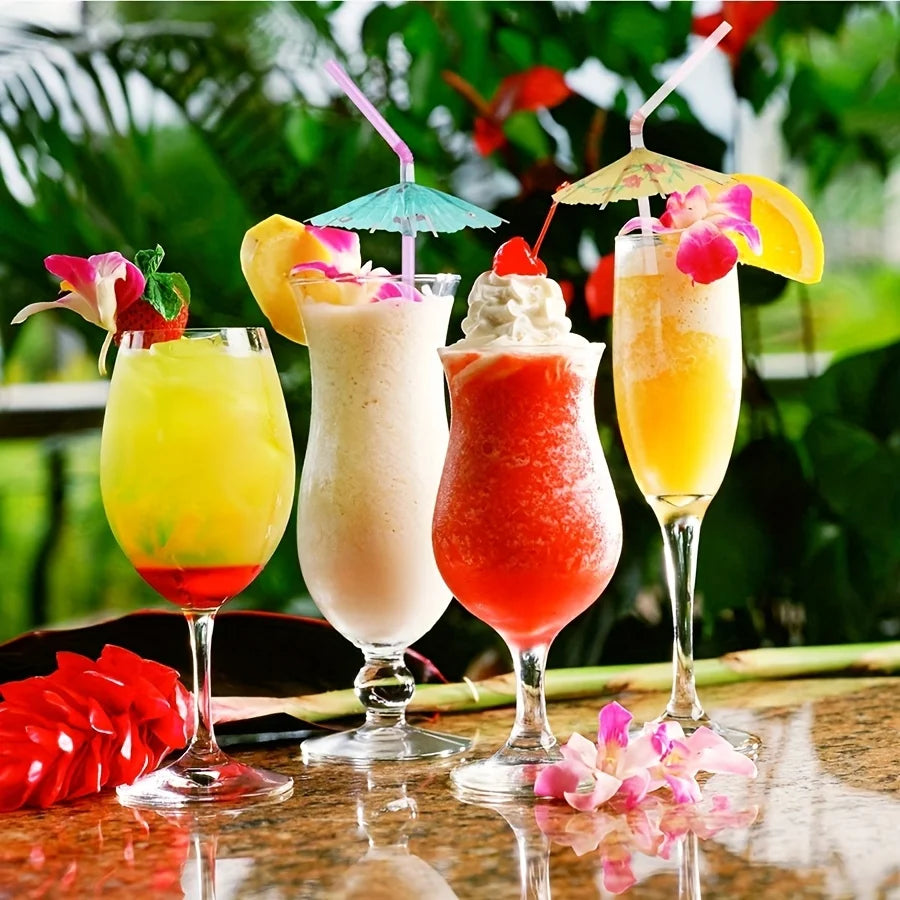 A collection of colorful mini paper drink umbrellas garnishing various cocktails and party drinks.