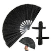 A black glitter holographic hand fan is shown open, with a closed fan and the handle separately displayed.
