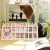 A pink photo frame keepsake showing monthly growth photos for a baby's first year