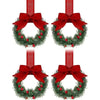 Set of four mini Christmas wreaths with red ribbon bows and red berries