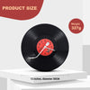 Schwarze Vinyl-Wanduhr mit rotem Zifferblatt und weißer Zeigern, zeigt Produktgröße und Gewicht.