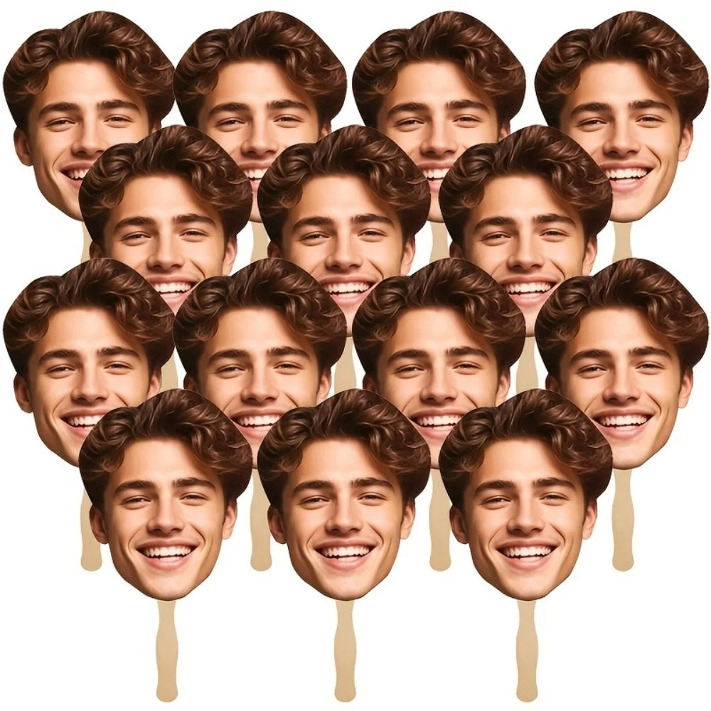 A collection of custom face photo props on sticks featuring young men's smiling faces.