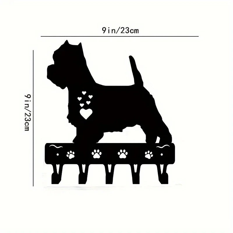 Black silhouette of a dog standing on decorative metal key hooks for wall organization