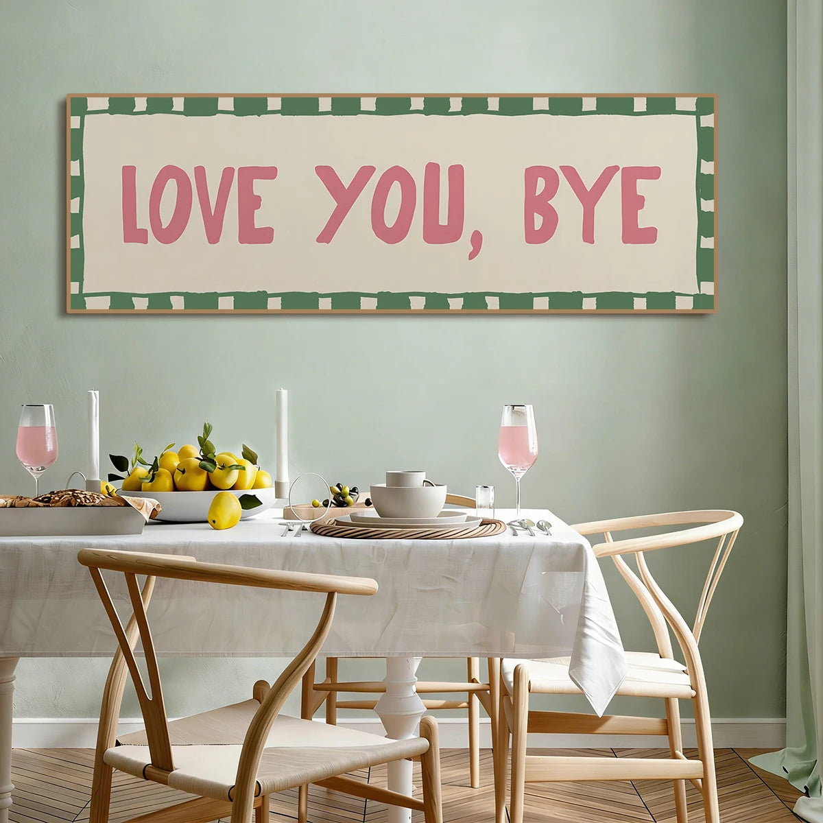 A framed canvas art print featuring the text LOVE YOU BYE in pink lettering on a light background with a green checkered bord
