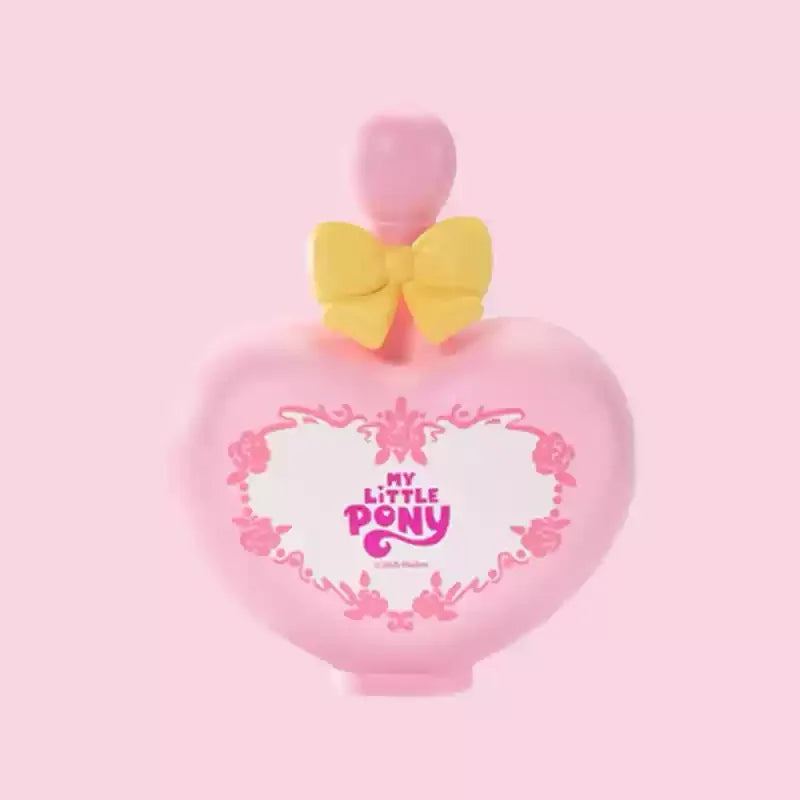 A pink bottle shaped like a heart with a yellow bow, a My Little Pony collectible figurine.