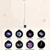 A white projection light fixture is shown above a grid displaying twelve different starry projection patterns.