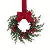 Set of two festive Christmas wreaths with green foliage and red ribbon for home decor
