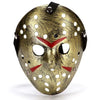 A realistic horror animal mask with a textured gold and brown finish featuring perforations and red accents.