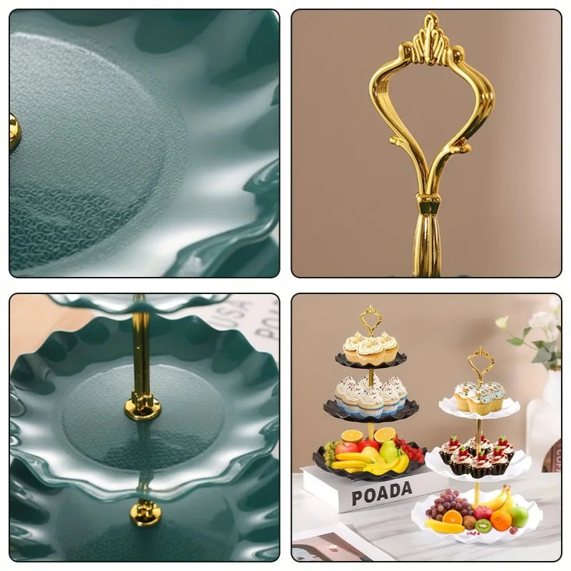 A set of three tiered plastic dessert stands in gold and dark green colors.