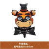 An orange and black foil balloon shaped like a bear's head for a themed party decoration.