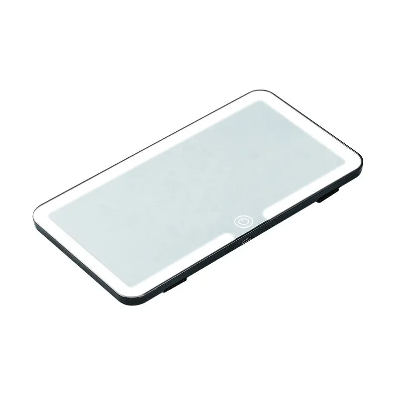A rectangular vanity mirror with an integrated LED light, designed for car sun visors.