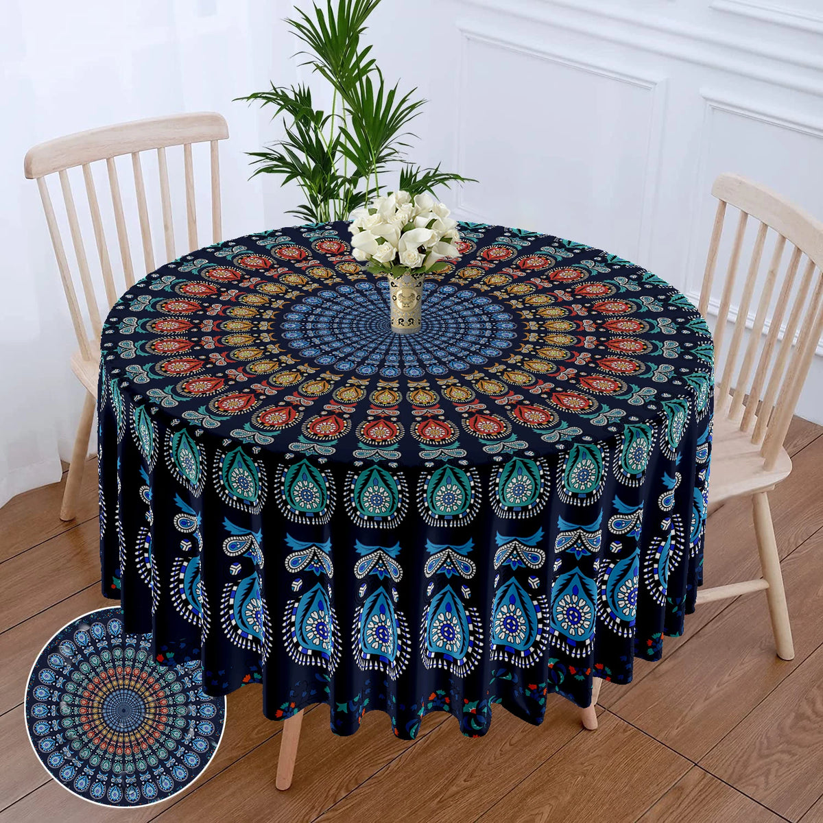 Bohemian peacock mandala round tablecloth displayed on a wooden table with chairs in a bright room.