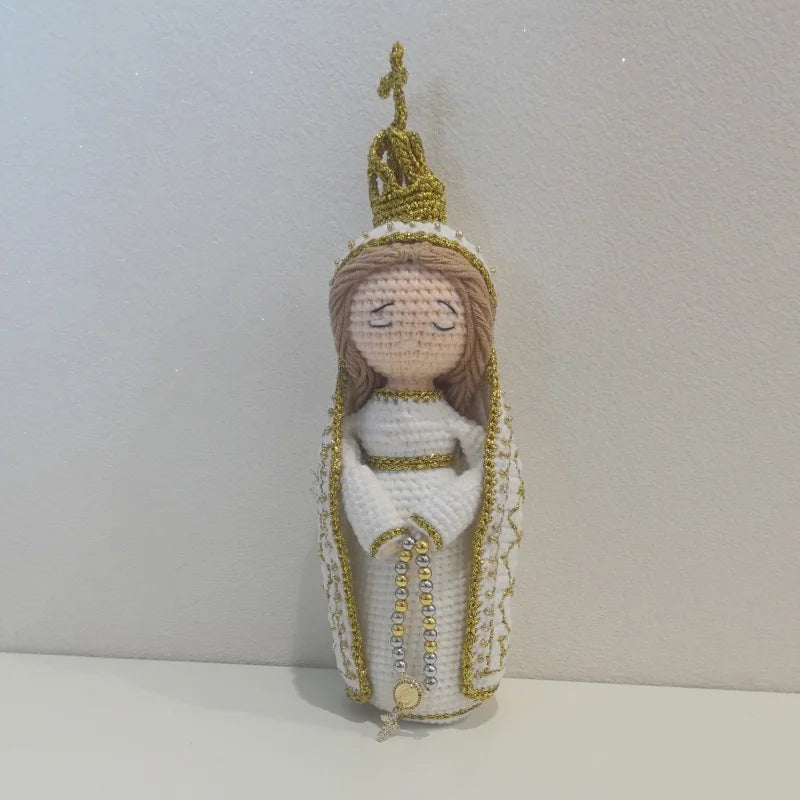 Handcrafted Virgin Mary crochet doll with a gold crown and white garment