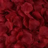 Deep red simulation silk rose petals used for event decoration