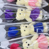 A bouquet of artificial rose soap flowers wrapped in clear plastic bags