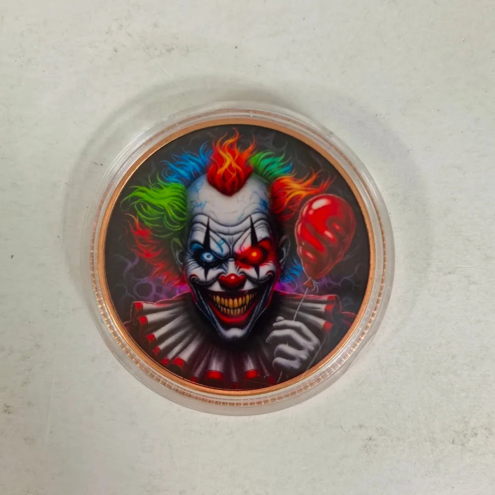 A challenge coin featuring a stylized Grim Reaper face with vibrant hair and red accents.