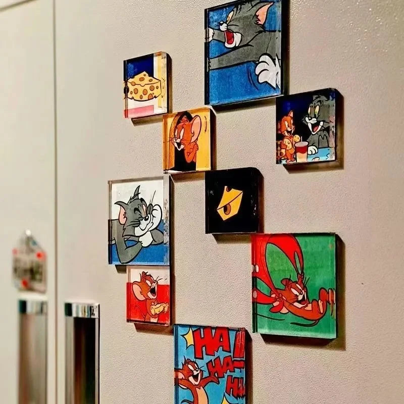A collection of custom fridge magnets featuring characters from Tom and Jerry