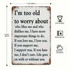 A rectangular distressed metal tin sign with text about being too old to worry and expressing love and support.