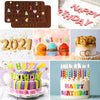 A set of heart-shaped silicone chocolate molds with letters and numbers used for birthday decorations.