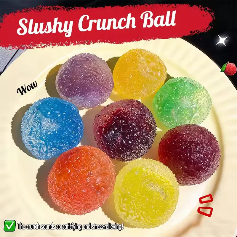 A plate of colorful Slushy Crunch Balls in various shades including purple, yellow, green, and red.