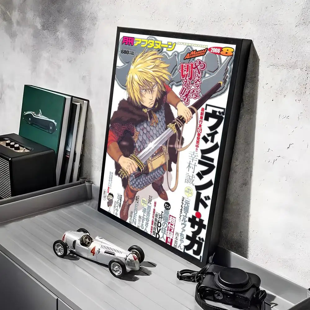 A poster featuring a character from Vinland Saga anime, displayed on a wall next to a model car.