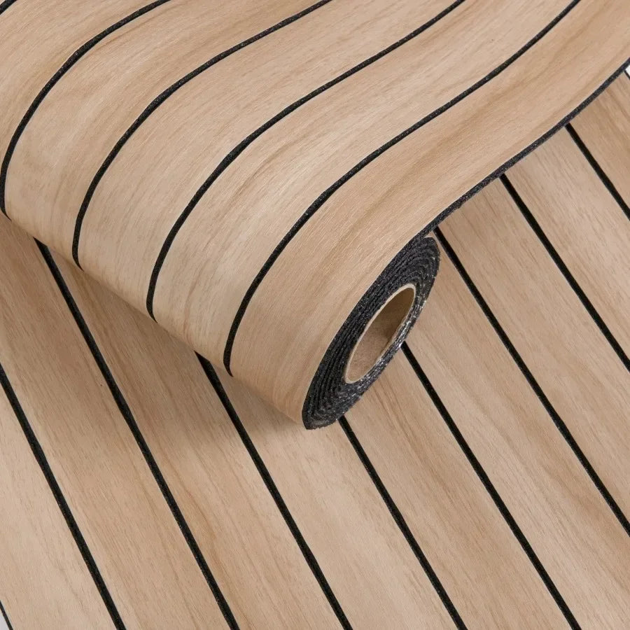 Roll of self-adhesive 3D wood grain wall panels showing parallel light wood planks and a dark adhesive tape roll.