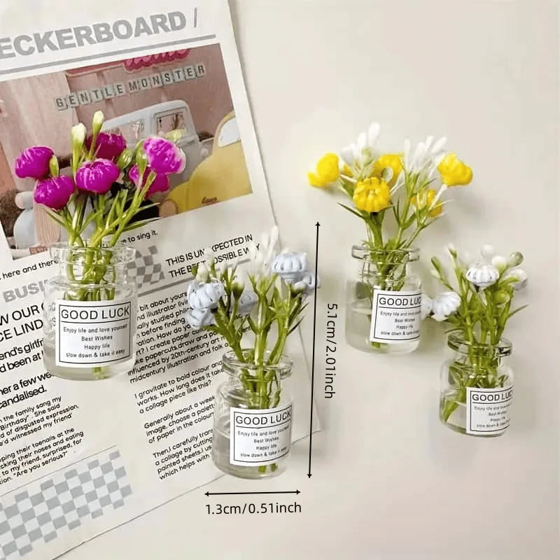 A collection of small glass jars filled with fresh greenery and flowers used for decoration.