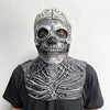 A realistic latex skull mask with intricate bone details is displayed against a white background.