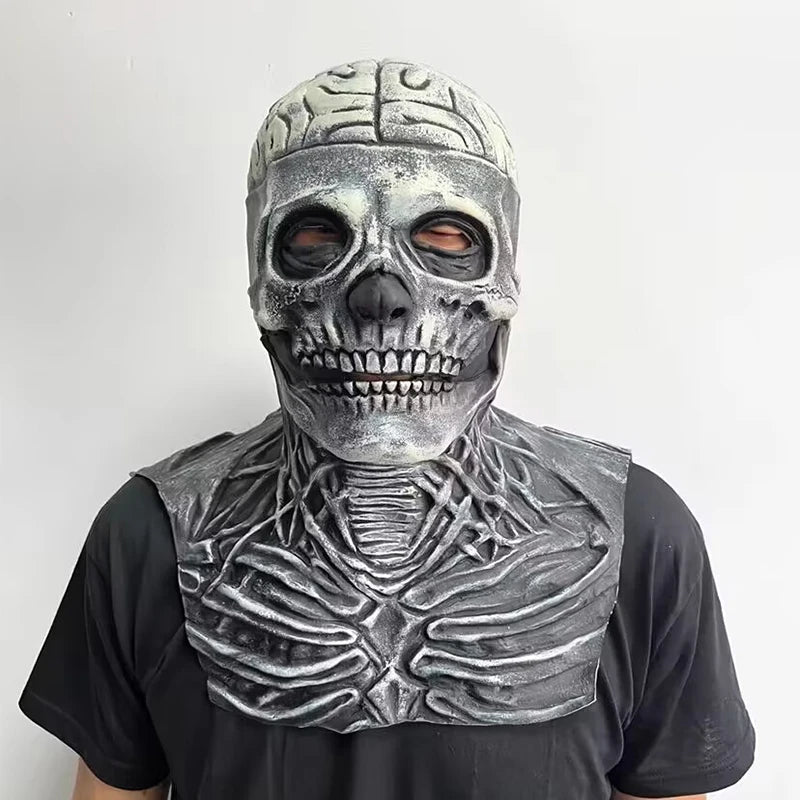 A realistic latex skull mask with intricate bone details is displayed against a white background.