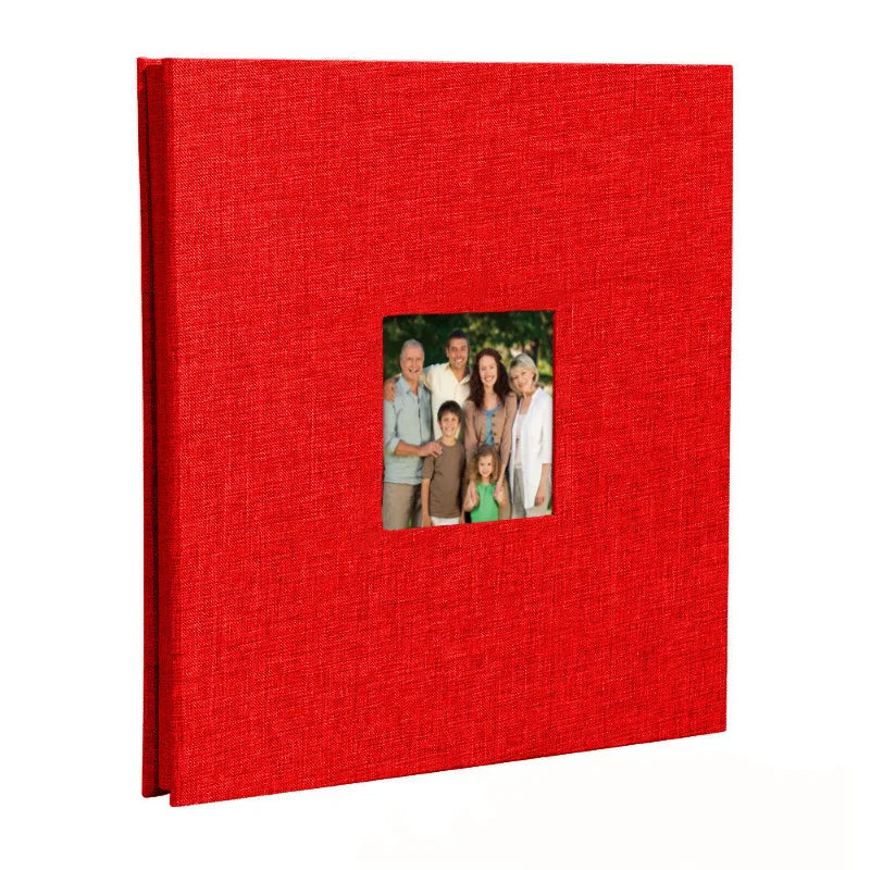 A red linen front scrapbook memory book with a photo of a family.