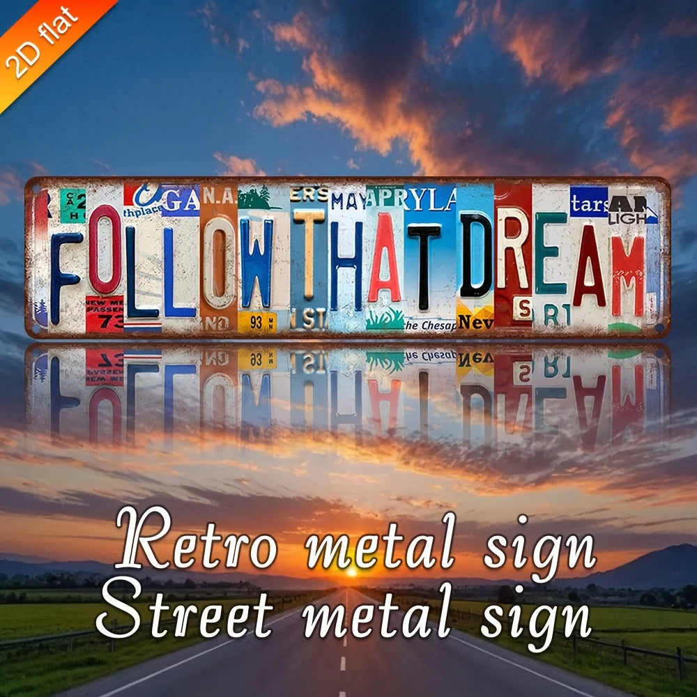 Retro metal sign with the text FOLLOW THAT DREAM displayed against a sunset sky.