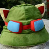 A green knit cap plush toy resembling Tony Tony Chopper with red and blue accents