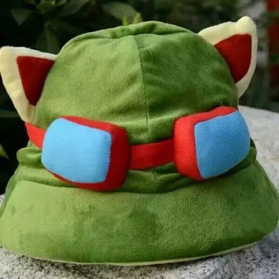 A green knit cap plush toy resembling Tony Tony Chopper with red and blue accents