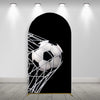 A black soccer football is displayed through a white mesh arch backdrop for a photo booth.