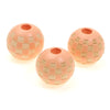 Two natural wooden checkered beads for jewelry making, light pink and tan.