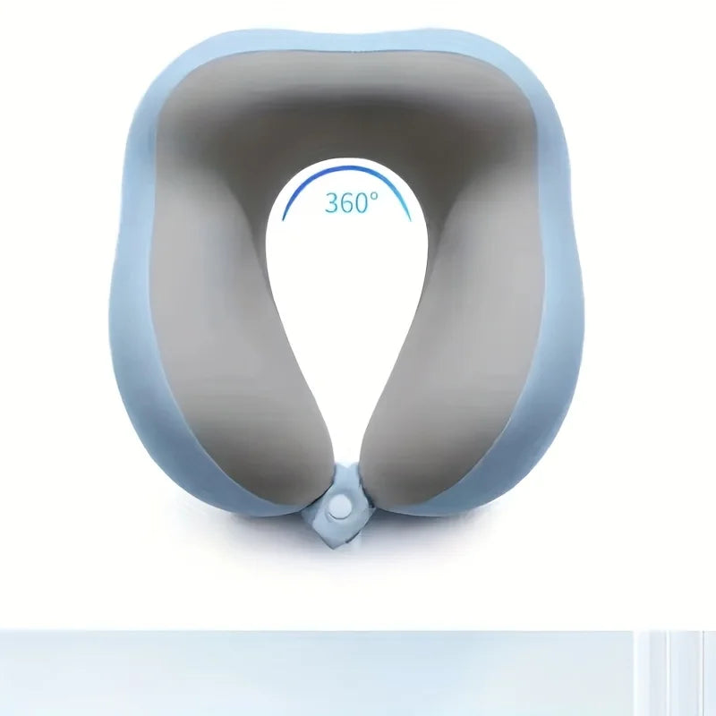 A light blue U-shaped memory foam neck pillow shown with a 360 degree indicator.