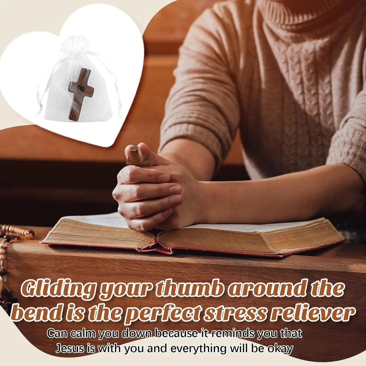A hand rests on an open book with a wooden cross, suggesting stress relief and faith.