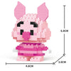A pink animal model built from micro building blocks, featuring large ears and a stylized face.