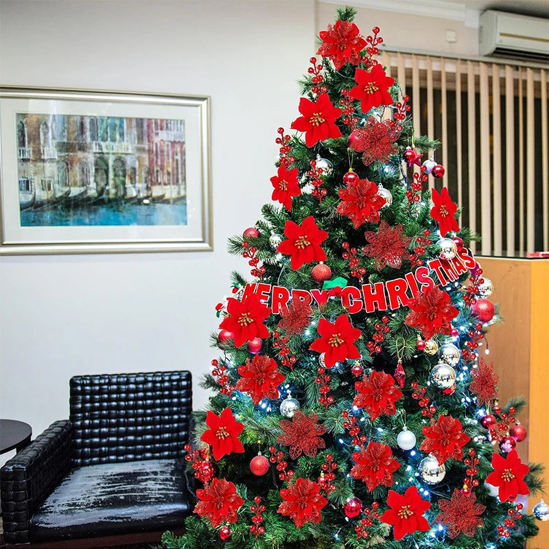 A brightly decorated Christmas tree adorned with red artificial flowers and ornaments.