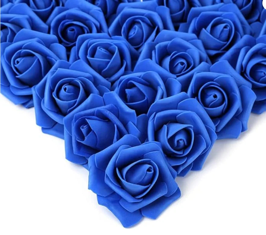 A cluster of deep blue artificial foam rose decorations.