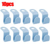 A set of 10 light blue plastic hanger connector hooks for organizing clothes.