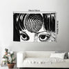 Black and white tapestry wall hanging featuring a close-up of an eye and surrounding hair texture.