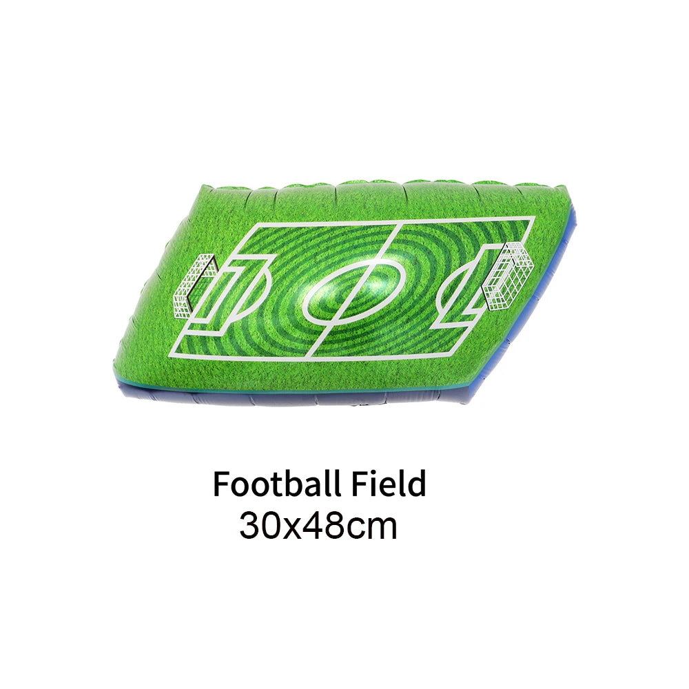 A green football field mat with white markings and goalposts for a party decoration.