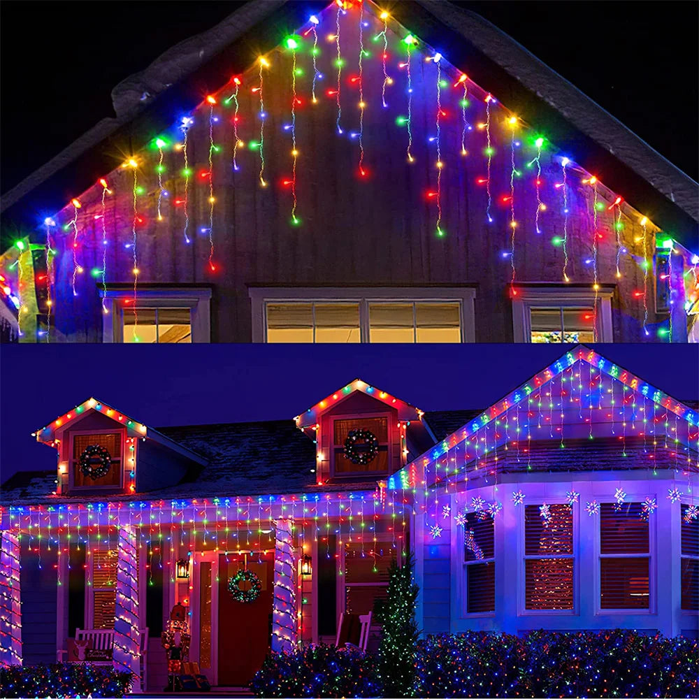 Exterior view of a house decorated with colorful waterfall curtain string lights for Christmas and outdoor display