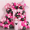 A pink and white balloon wreath archway set featuring balloons in shades of pink, black, and white.