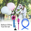 A tool kit set for balloon filling, including a metal inflator and various tools, shown outdoors.